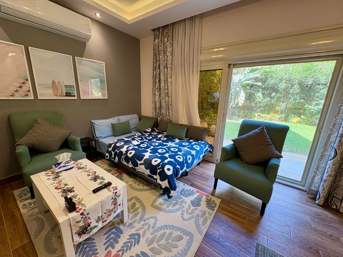 The living-room sofa opened out into a double bed