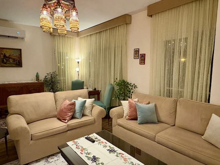 Comfortable seating beneath the colourful Egyptian pendant light